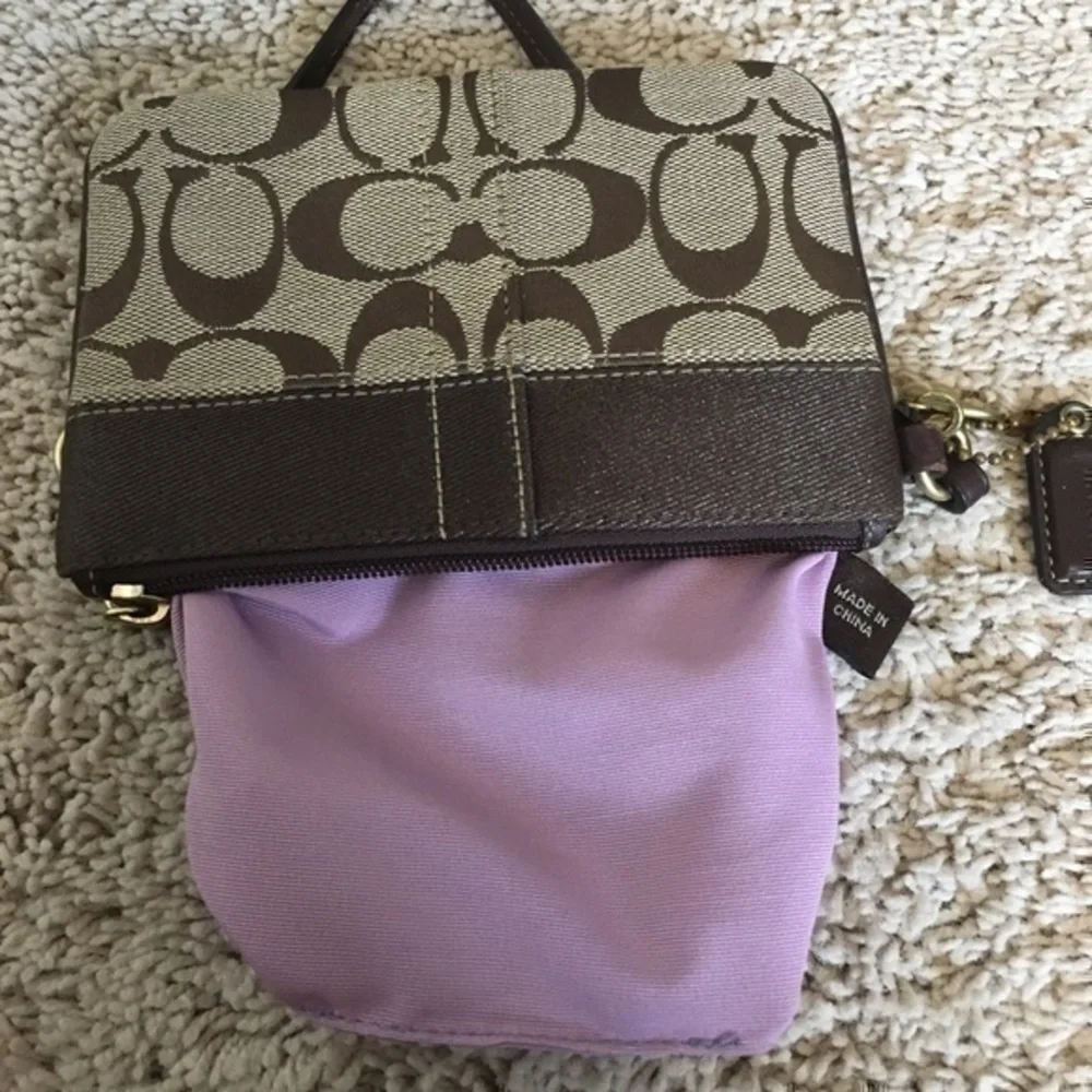 Coach Khaki signature stripe wristlet